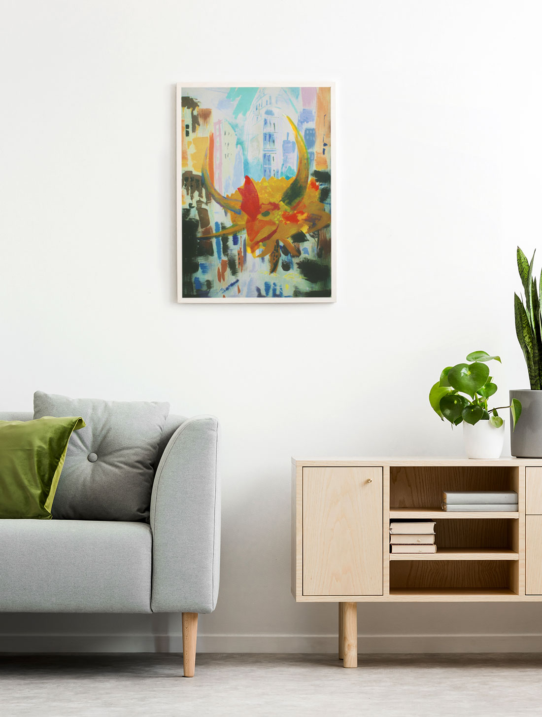 Vegigante in Flatiron – a vibrant Puerto Rican-inspired painting of a fiery vejigante mask set against New York’s Flatiron Building Framed vejigante mask painting with Flatiron Building displayed in a modern living room.
